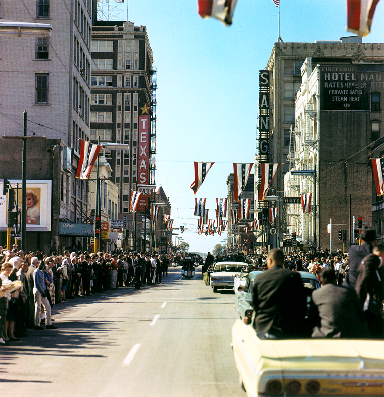 President Kennedy's motorcade travelling along Main Street in Dallas toward Dealey Plaza